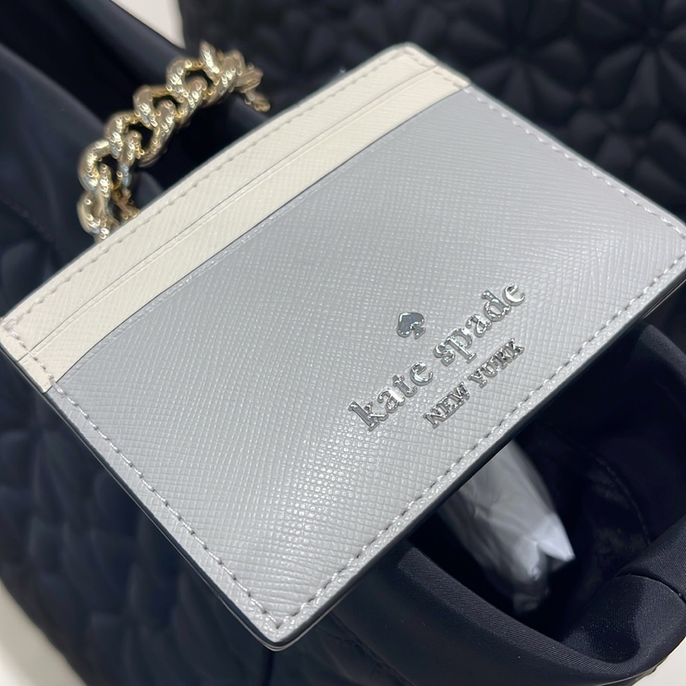 Kate Spade Madison Small Slim Card Holder
Platinum Grey Multi
NWT - Picture 16 of 16